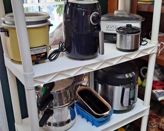 Crock Pots, Rice Cookers, Steamers and a large assortment of bakeware and cookware!