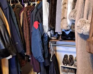 Nice assortment of women's clothing -- Coats, vests, Jackets, garment bags, shoes, sandals, etc.