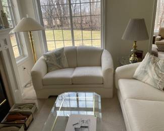 loveseat and matching couch and glass coffee table