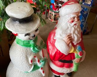 black Santa and snow man blow molds