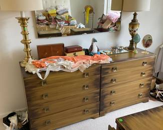 two clean dressers with lingerie on top