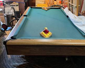The pool table with nothing on it!!  We could not find a name, but it has 1" full slate