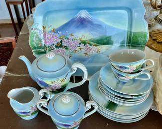 Japan hand painted tea set: tray, teapot, creamer, sugar, 6 plates, 6 saucers, 5 cups.  Beautiful color on this set!
