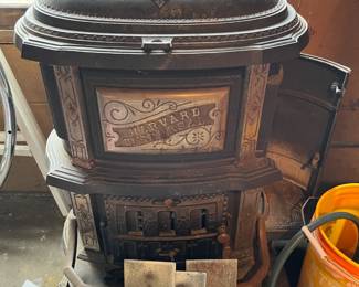 Really nice stove for your cabin.  Large fire box and loads from side