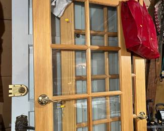 French doors in front. Solid heavy front door behind.  We have a door frame for it too