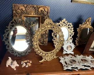 Cast picture frames and mirrors