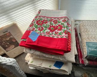 Lots of all new tablecloths: Christmas, summer, lace, embroidered with napkins