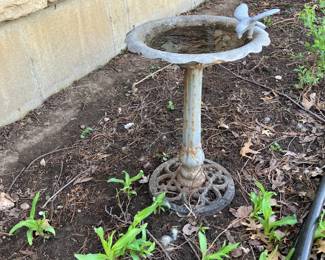 One of many cast aluminum bird baths