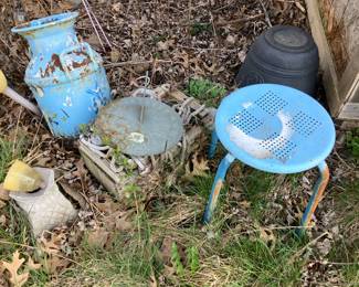 Milk can, sun dial, metal stool
