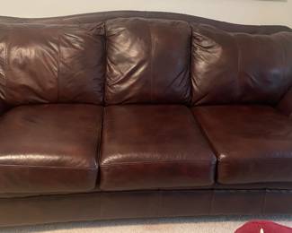 Large Ashley Furniture Leather Sofa. Coffee Color. Top condition!