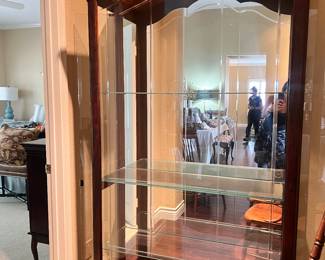 Howard Miller Cabinet-lights up with side openings!