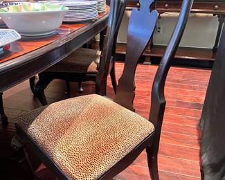 Beautiful leopard fabric shell motif dining room chairs