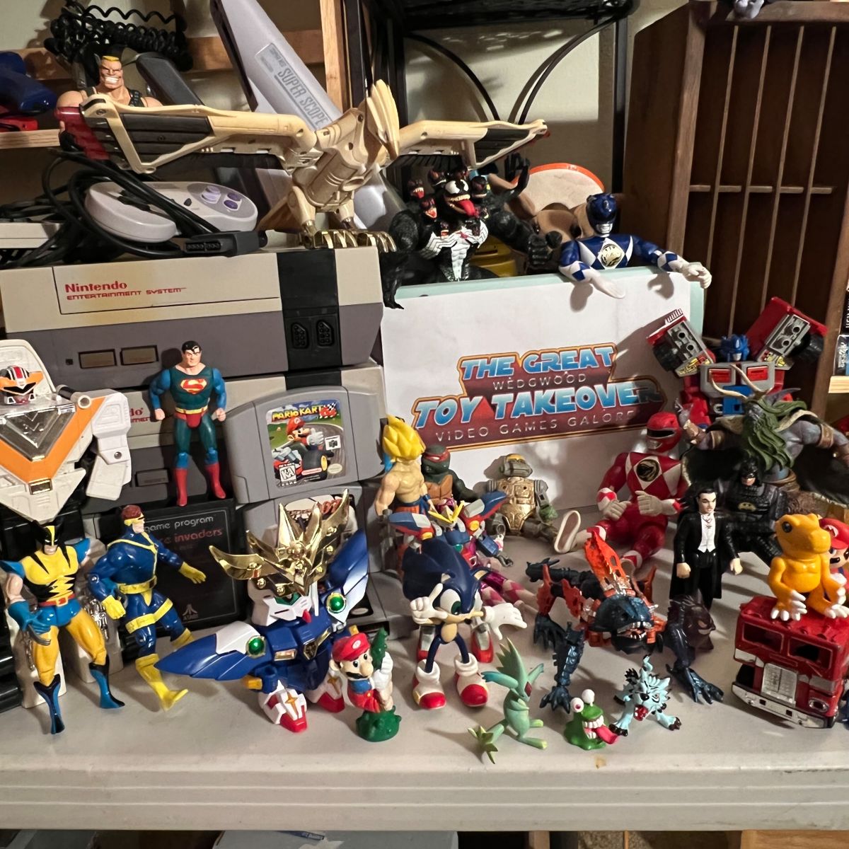This house is holding tins of normal useful stuff, designer clothing, nice jewelry, lots of utilitarian stuff and… an amazing collection of figures, video game systems & games !!! Get to clicking