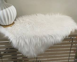 White furry rug,  51" x 22",  $24
