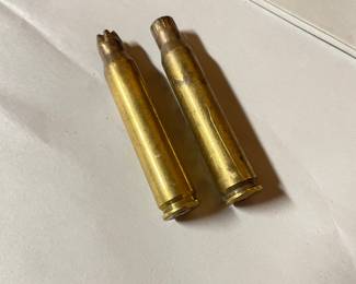 2 shot gun bullet cartridges,  $1