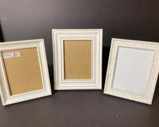 White frames, 8" x 11",  $7 each