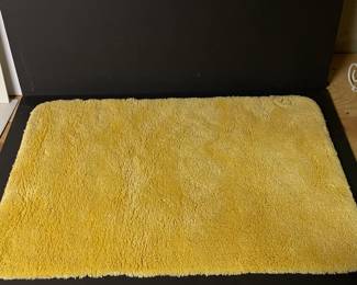 Yellow plush throw rug,  was $10, NOW $7