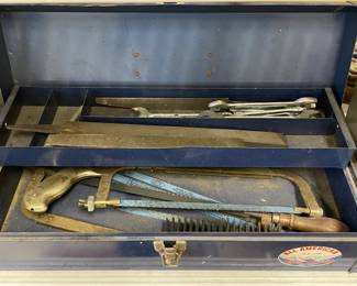 view of contents of blue tool box ~