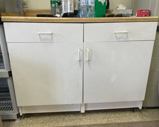 White cabinet on casters w/2 drawers with counter top ,  was $85, NOW $55