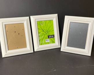 2 white frames 5" x 7",  was 6 each, NOW $4 each . (far right - Frame with black background not for sale)