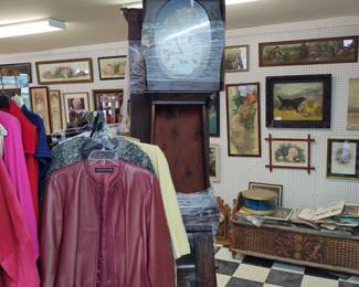 Vintage clothing and grandfather clocks in need of repair