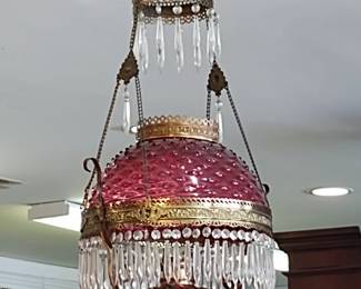 Hanging cranberry lamp electrically wired