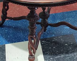 Beautifully made mahogany table from the Victorian era coffee and balls