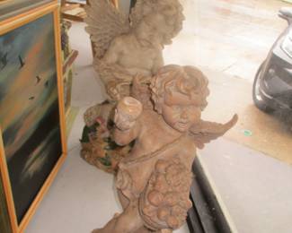 Two composition cherubs