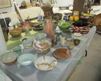 Pottery, most by Newcomb 1950s potters like Lucianne   Carmichael and Beverly Smith. Also, other New Orleans pieces like Potsalot.