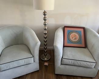 Pair of pale
Blue ultra suede swivel chairs 