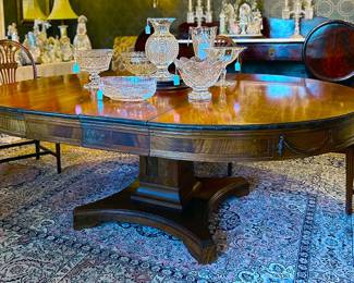This large dining table can be made to be round or extended to banquet size easily. 