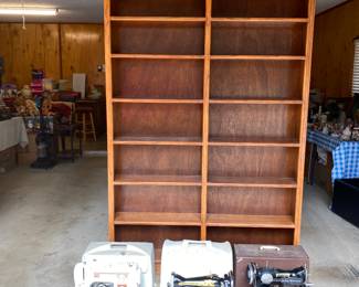 Huge wooden cabinet and 3 sewing machines 