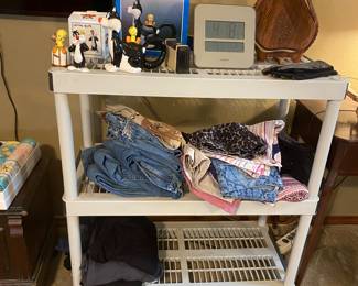 Felix and Sylvester items, shorts, women’s swimsuits, prom dresses, lots of denim jeans in various sizes 