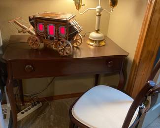 Beautiful lighted stagecoach lamp, desk w matching chair and unique lamps 