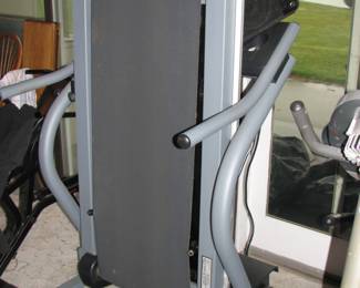 treadmill and just to the left is a rowing type machine