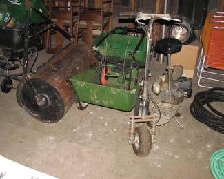 lawn roller, another spreader, vintage John Deere wagon, scooter garden hoses
