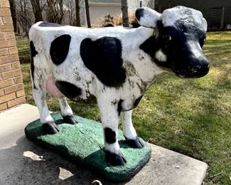 Concrete cow & horse statues