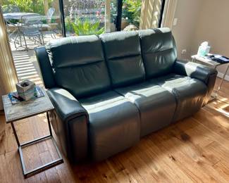 Two recliner chairs, one on each end. Sofa is high quality faux leather. Great condition.