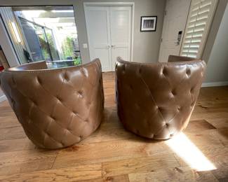 Leather swivel tub chairs by Bernhardt.