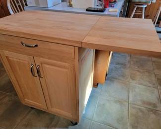 Butcher block top rolling island