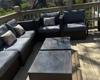 #100)  - $900 - Ten piece outdoor furniture set.  This Set includes all of the outdoor brown wicker sectional sofas pieces and the two matching coffee tables.  You will see these in the next several photos.  Grey Side chairs and white round side tables sold separately.  Set includes the brown cushions and accent pillows.  
