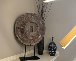 30) $75 - Home decor grouping of three items. For reference the round disk piece measures 45 inches tall by 32 inches wide.