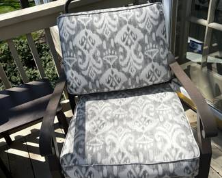 #101)  - $300 - Set of 2 round swivel chairs with grey/white cushions and the center accent table.