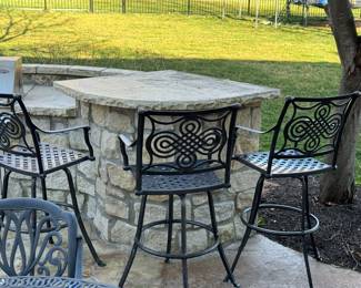 26) $275 - Set of three outdoor die cast iron bar stools. 24" x 24" x 30" x 48".