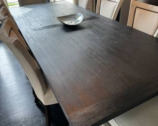 1) $950 - Black dining room table and six dining chairs from Restoration Hardware. Table measures 43" x 108" x 30 and has a couple of nicks. Almond colored linen upholstered dining chairs show wear and stains. Chairs measure 21" x 28" x18" x 40".