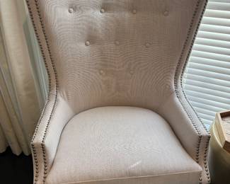 29) $275 Tall back upholstered chair. 34" x 27". Seat height 20". Overall height 46".
