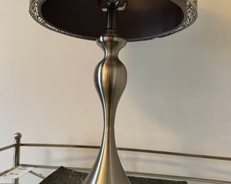 15) $60 - Silver lamp with metal overlay shade over gray shade. 15" x 15" x 25".