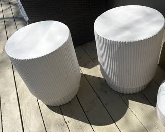 #102)  - $150 - Set of 2 round white composite outdoor patio tables. 