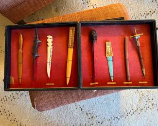 Cased collection of international letter openers 