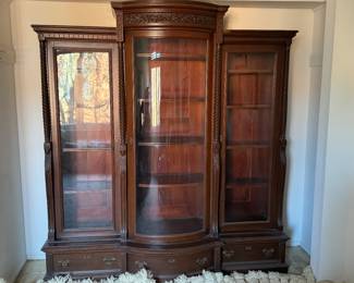 Antique carved mahogany bookcase with curved center section 76"h x 70"w x 23"d